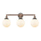 Beacon Bath Vanity Light shown in the Antique Copper finish with a Matte White shade