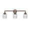 Colton Bath Vanity Light shown in the Antique Copper finish with a Clear Halophane shade