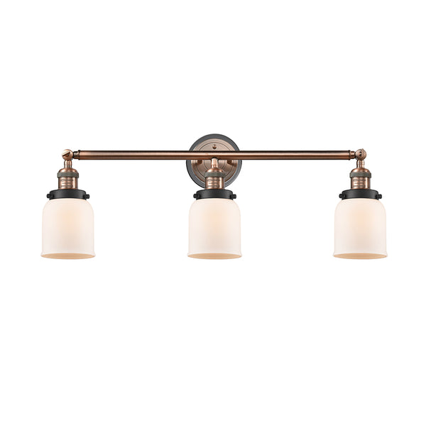 Bell Bath Vanity Light shown in the Antique Copper finish with a Matte White shade
