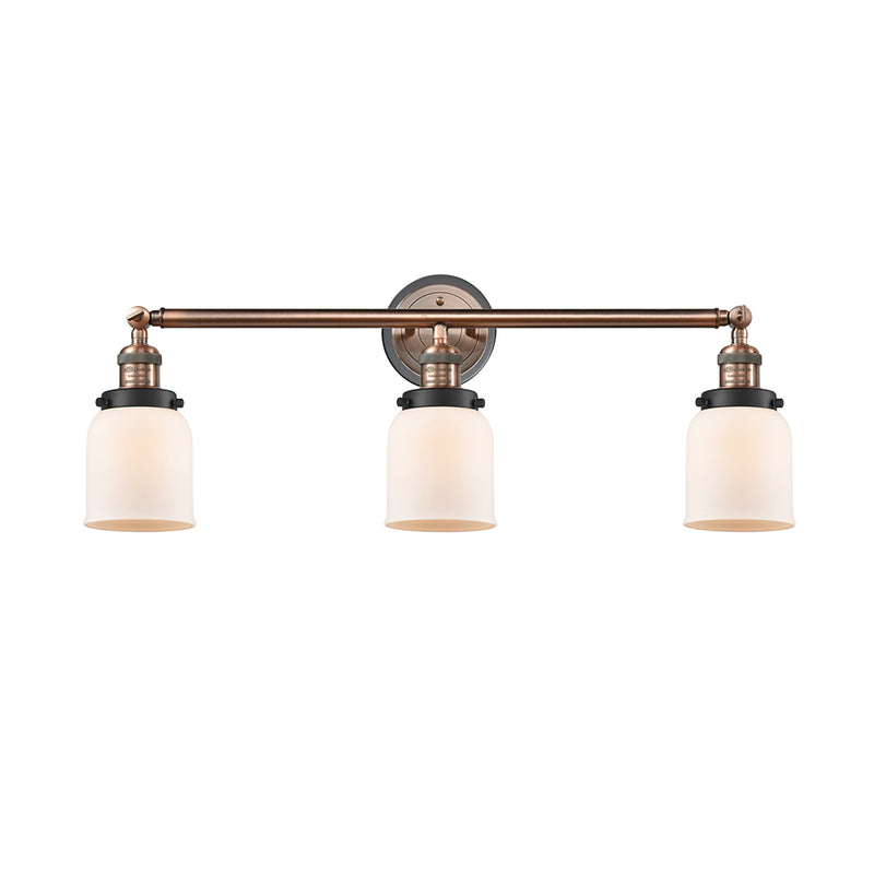 Bell Bath Vanity Light shown in the Antique Copper finish with a Matte White shade