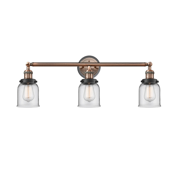 Bell Bath Vanity Light shown in the Antique Copper finish with a Clear shade