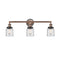 Bell Bath Vanity Light shown in the Antique Copper finish with a Clear shade