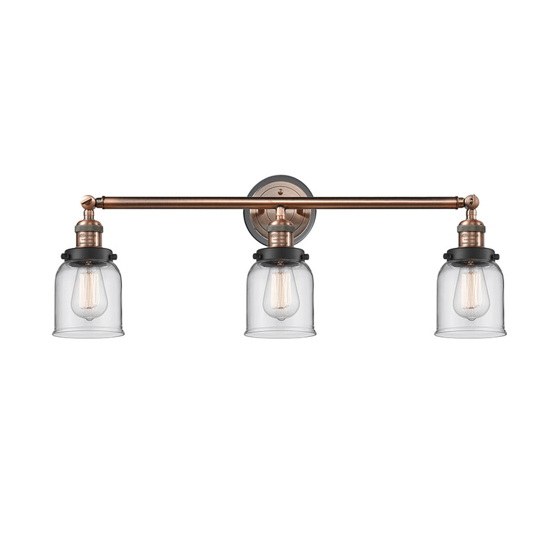 Bell Bath Vanity Light shown in the Antique Copper finish with a Clear shade