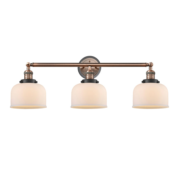 Bell Bath Vanity Light shown in the Antique Copper finish with a Matte White shade