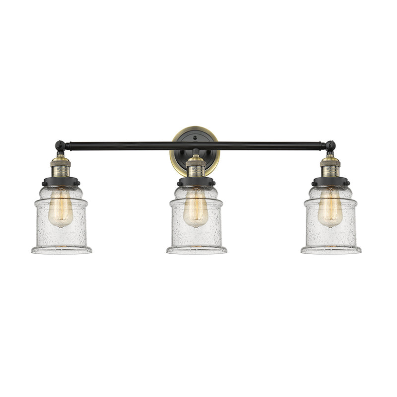 Canton Bath Vanity Light shown in the Black Antique Brass finish with a Seedy shade