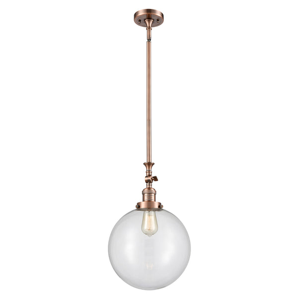 Beacon Mini Pendant shown in the Antique Copper finish with a Clear shade