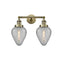 Geneseo Bath Vanity Light shown in the Antique Brass finish with a Clear Crackled shade
