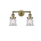 Canton Bath Vanity Light shown in the Antique Brass finish with a Clear shade