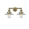 Halophane Bath Vanity Light shown in the Antique Brass finish with a Clear Halophane shade