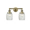 Colton Bath Vanity Light shown in the Antique Brass finish with a Clear Halophane shade