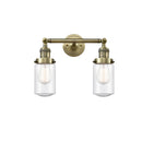 Dover Bath Vanity Light shown in the Antique Brass finish with a Seedy shade