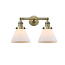 Cone Bath Vanity Light shown in the Antique Brass finish with a Matte White shade