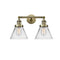 Cone Bath Vanity Light shown in the Antique Brass finish with a Clear shade