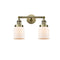 Bell Bath Vanity Light shown in the Antique Brass finish with a Matte White shade