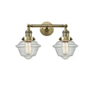 Oxford Bath Vanity Light shown in the Antique Brass finish with a Seedy shade