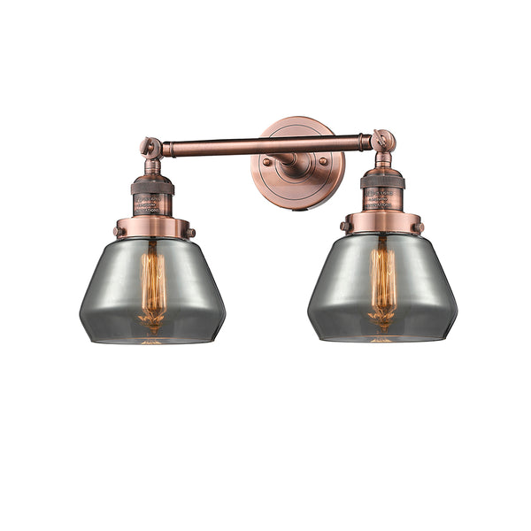 Fulton Bath Vanity Light shown in the Antique Copper finish with a Plated Smoke shade