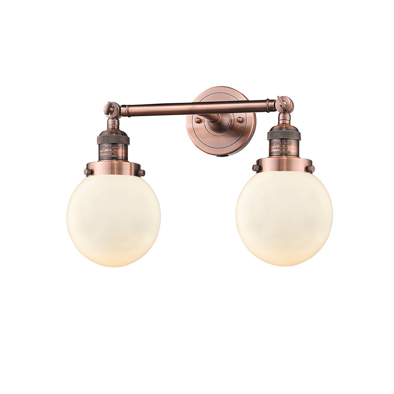 Beacon Bath Vanity Light shown in the Antique Copper finish with a Matte White shade