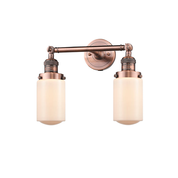 Dover Bath Vanity Light shown in the Antique Copper finish with a Matte White shade