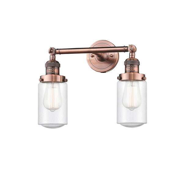 Dover Bath Vanity Light shown in the Antique Copper finish with a Seedy shade