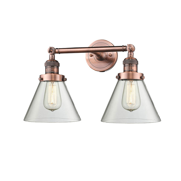 Cone Bath Vanity Light shown in the Antique Copper finish with a Clear shade