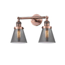 Cone Bath Vanity Light shown in the Antique Copper finish with a Plated Smoke shade