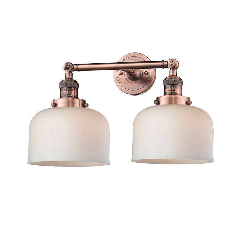 Bell Bath Vanity Light shown in the Antique Copper finish with a Matte White shade