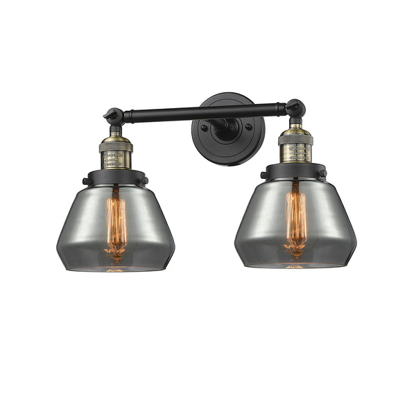 Fulton Bath Vanity Light shown in the Black Antique Brass finish with a Plated Smoke shade