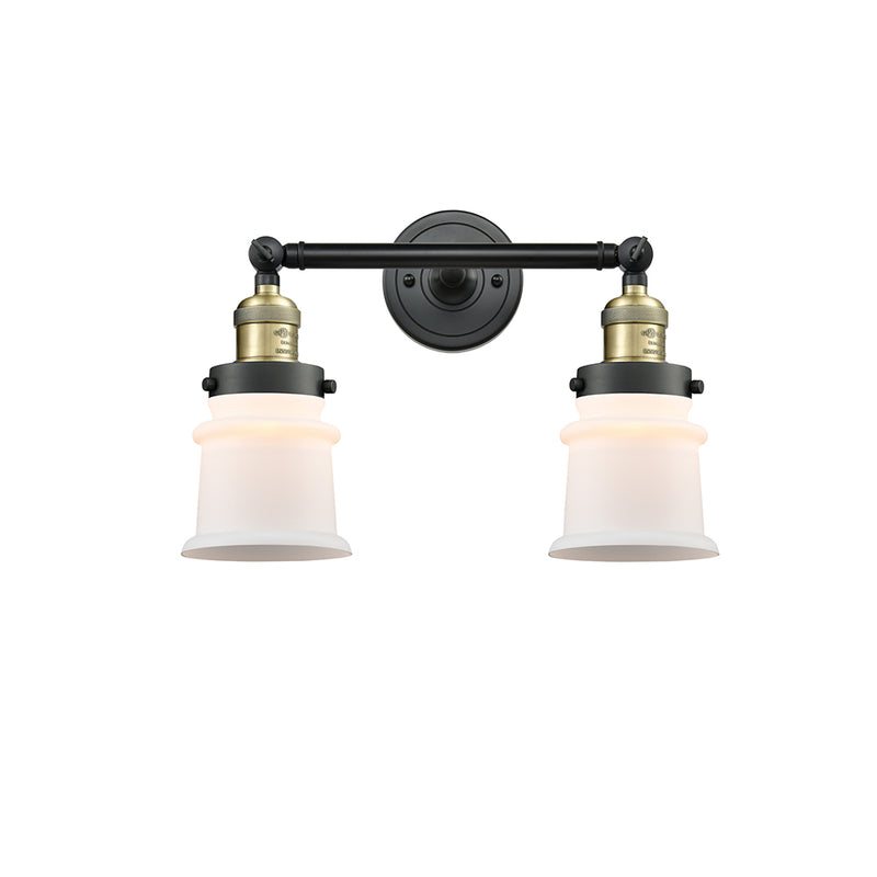 Canton Bath Vanity Light shown in the Black Antique Brass finish with a Matte White shade