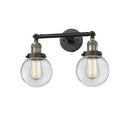 Beacon Bath Vanity Light shown in the Black Antique Brass finish with a Clear shade