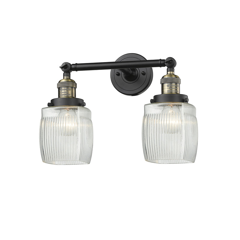 Colton Bath Vanity Light shown in the Black Antique Brass finish with a Clear Halophane shade