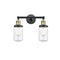 Dover Bath Vanity Light shown in the Black Antique Brass finish with a Clear shade