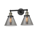 Cone Bath Vanity Light shown in the Black Antique Brass finish with a Plated Smoke shade