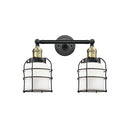 Bell Cage Bath Vanity Light shown in the Black Antique Brass finish with a Matte White shade