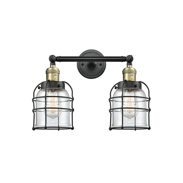 Bell Cage Bath Vanity Light shown in the Black Antique Brass finish with a Clear shade