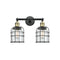 Bell Cage Bath Vanity Light shown in the Black Antique Brass finish with a Clear shade