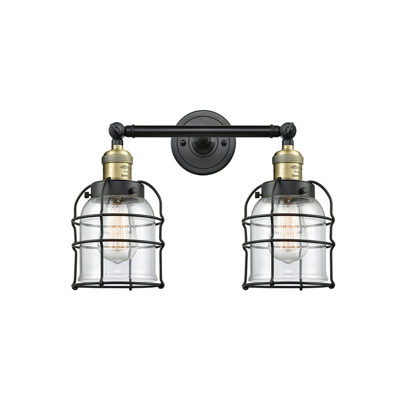 Bell Cage Bath Vanity Light shown in the Black Antique Brass finish with a Clear shade