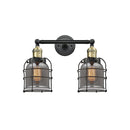 Bell Cage Bath Vanity Light shown in the Black Antique Brass finish with a Plated Smoke shade