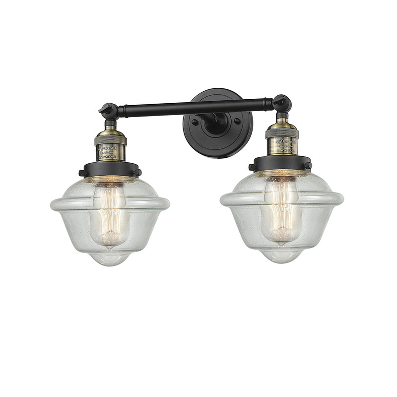 Oxford Bath Vanity Light shown in the Black Antique Brass finish with a Seedy shade
