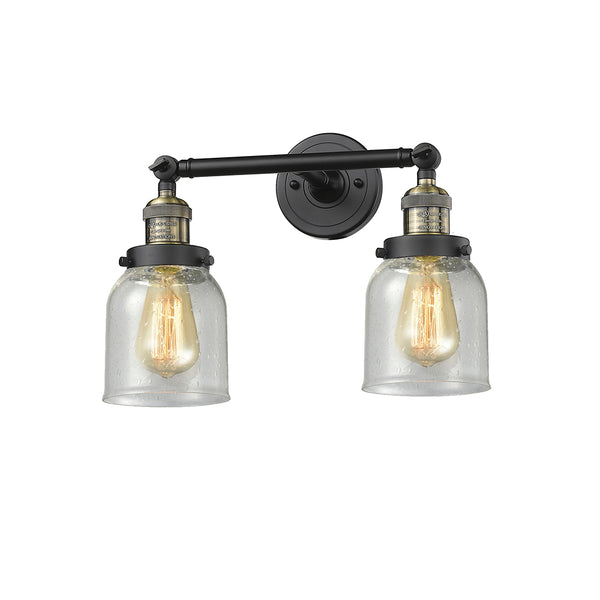 Bell Bath Vanity Light shown in the Black Antique Brass finish with a Seedy shade