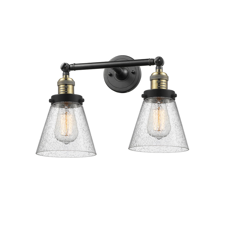Cone Bath Vanity Light shown in the Black Antique Brass finish with a Seedy shade