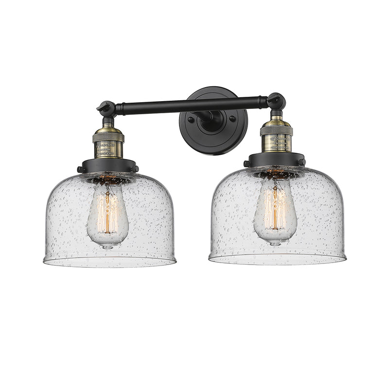 Bell Bath Vanity Light shown in the Black Antique Brass finish with a Seedy shade