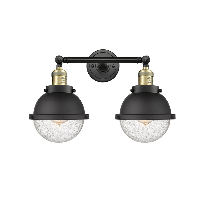 Hampden Bath Vanity Light shown in the Matte Black finish with a Seedy shade