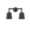 Addison Bath Vanity Light shown in the Black Antique Brass finish with a Matte Black shade