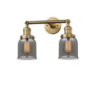 Bell Bath Vanity Light shown in the Brushed Brass finish with a Plated Smoke shade