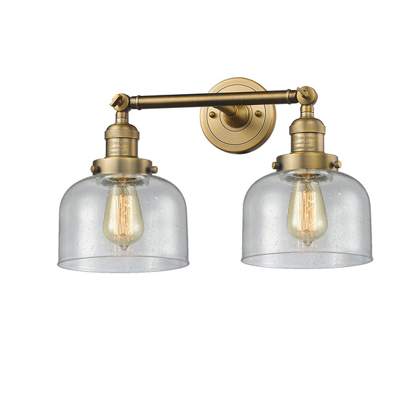 Bell Bath Vanity Light shown in the Brushed Brass finish with a Seedy shade