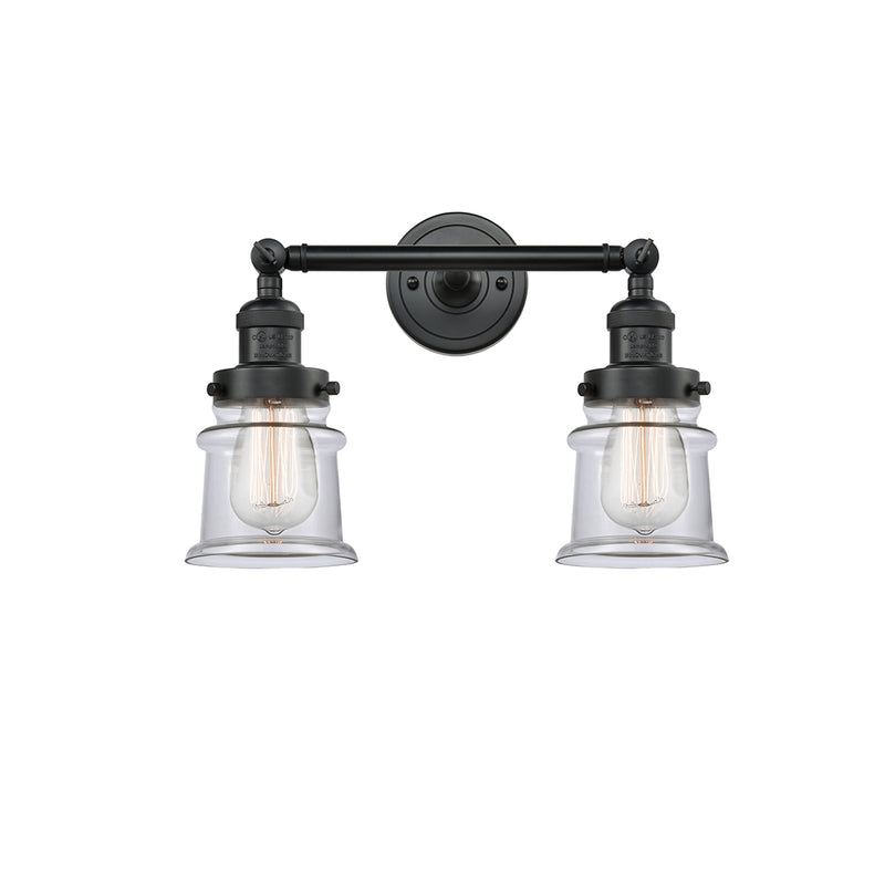 Canton Bath Vanity Light shown in the Matte Black finish with a Clear shade
