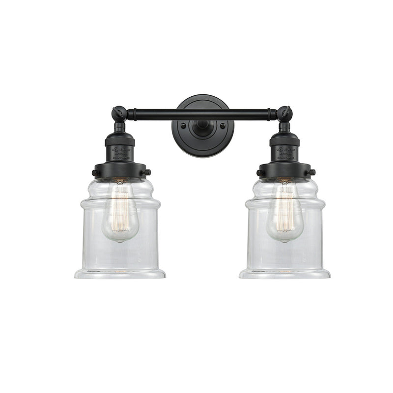 Canton Bath Vanity Light shown in the Matte Black finish with a Clear shade