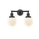 Beacon Bath Vanity Light shown in the Matte Black finish with a Matte White shade