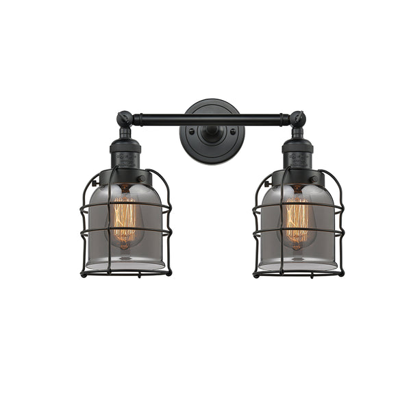 Bell Cage Bath Vanity Light shown in the Matte Black finish with a Plated Smoke shade