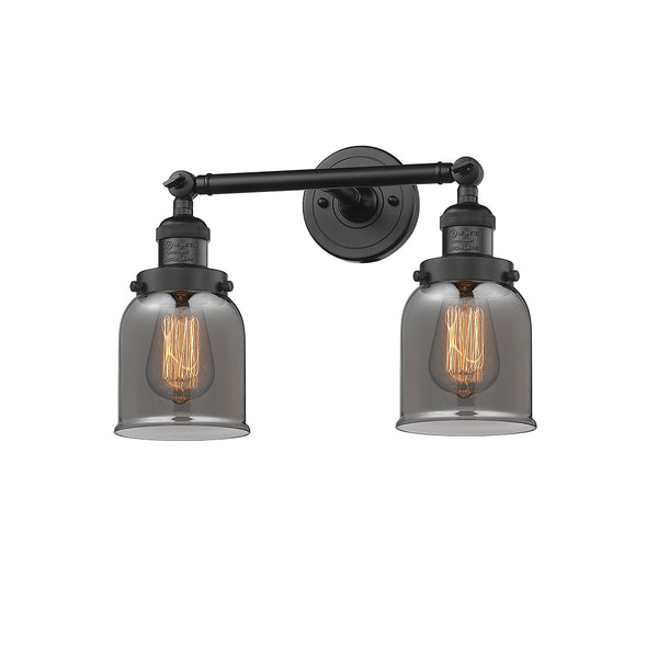 Bell Bath Vanity Light shown in the Matte Black finish with a Plated Smoke shade
